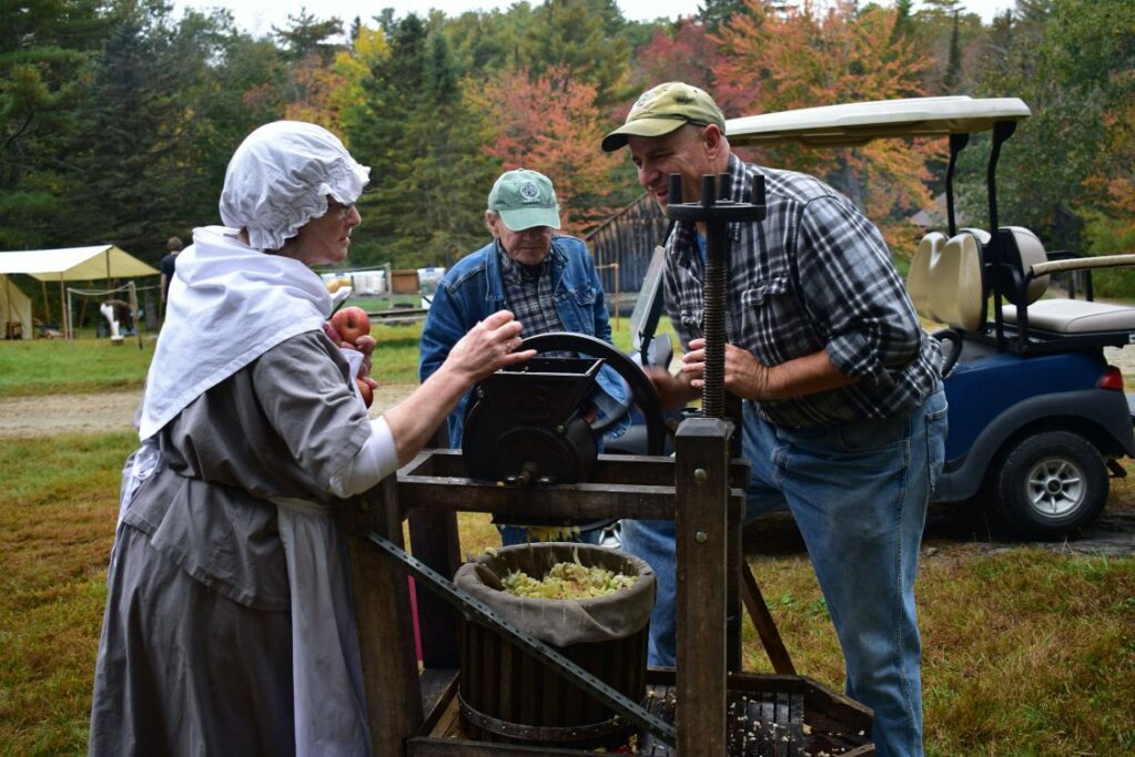 Pressing cider at Living History Days 2023.